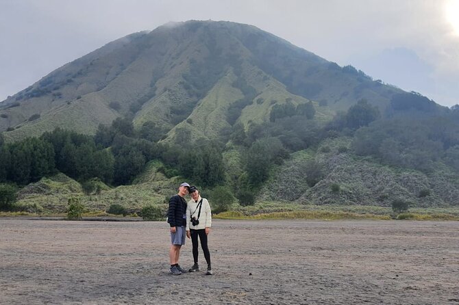 1 Day Bromo Private Day Tour with Madakaripura Waterfall - What to pack for sulfur air, dust, and hot steps