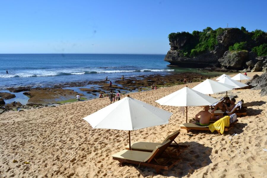 Bali: Full-Day Private White Sand Beaches and Sunset Tour - Uluwatu Temple at golden hour: sunset plus the dance ticket reality