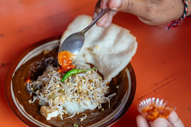 Bali Private Food Walking Tour With Locals: The 10 Tastings - Kuta Puri Bungalows Spa and the palace-side stories