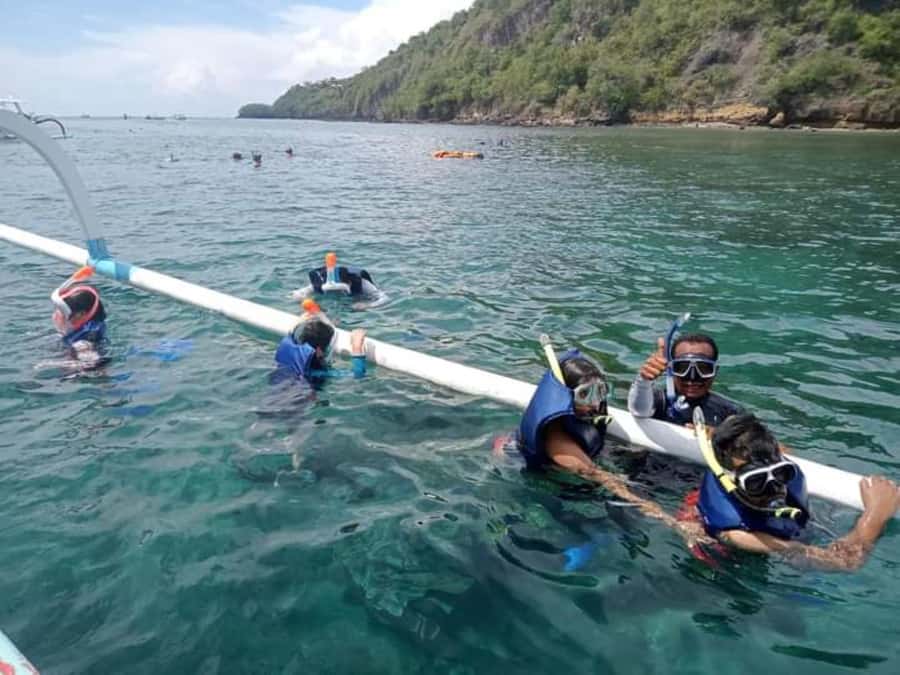 Blue Lagoon and Tanjung Jepun Snorkeling Tour - Blue Lagoon Beach snorkeling: coral reefs and a sea turtle hope