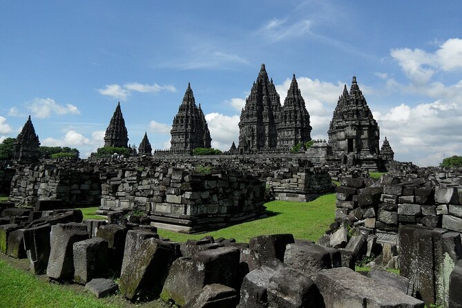 Borobudur and Prambanan Temples Shared Guided Tour With Transfer - Entering Borobudur: reliefs, Buddha statues, and timed access you do not have to manage