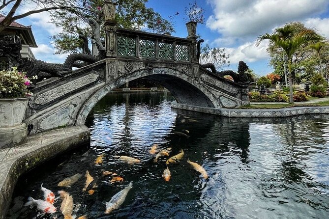 East Bali Tour - Gate of Heaven - Tirta Gangga - Tukad Cepung - Tirta Gangga Water Palace: A royal water garden that rewards slow walking