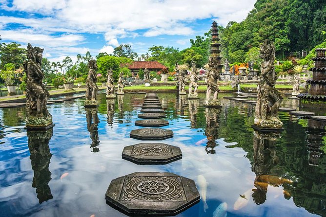 East Bali Tour: Gate of Heaven, Water Palace, Sleeping Gajah - Infinity pool reset: river views, swim suits, and post-lunch cooling