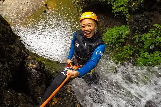 Intermediate canyoning tour in Bali " Maboya Canyon " - The descent: slides, jumps, and rappels in one connected run