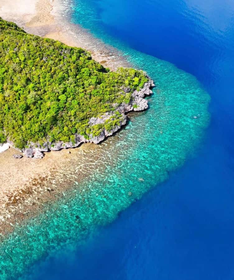 Labuan Bajo: Rangko Cave and Beach Snorkeling Half-Day Tour - Rangko Village and Wooden Boats: The Ride Feels Local
