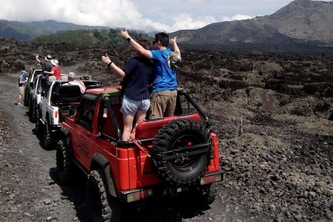 Mount Batur Sunrise Jeep Tour - After Sunrise: Jeep Tracks, Black Lava Views, and Kintamani Scale