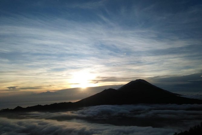 Mount Batur Volcano - Sunrise Trekking with White Water Rafting - Summit timing: sunrise, views over Lake Batur, and breakfast with coffee