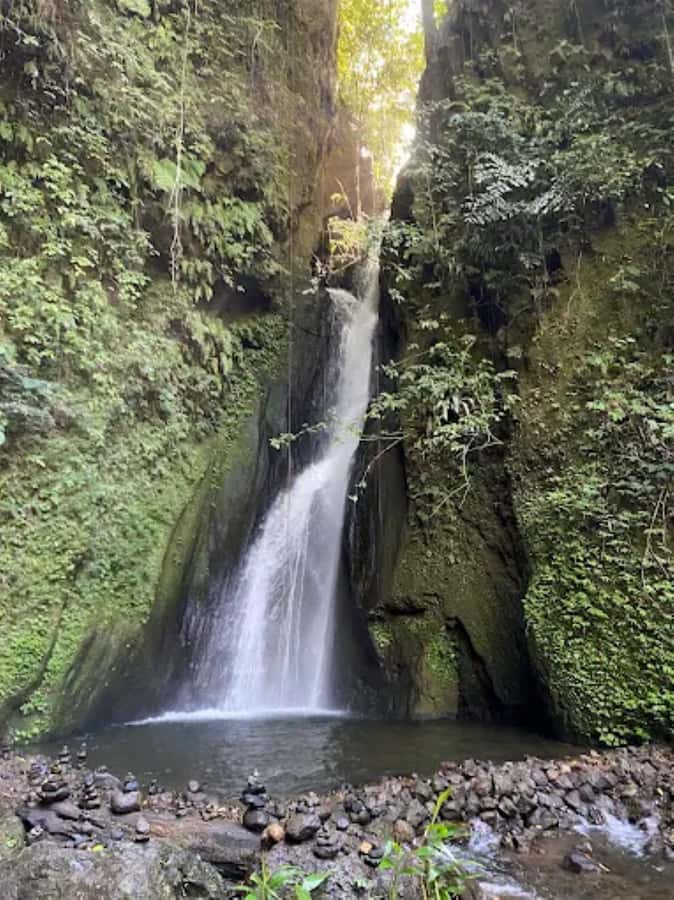 North Bali: Explore Munduk Waterfall Trekking Experience - Meeting Point at Melanting Cottages, and How the Day Usually Flows