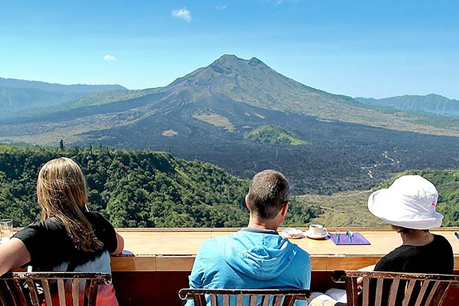 Private Tour: Waterfall, Kintamani Volcano, Ubud Tour with Lunch - Getting picked up in Kuta and riding in air-conditioned comfort