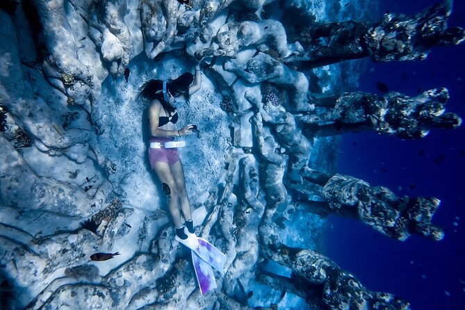 Snorkeling with turtle and statue in Gilis - Glass-bottom boat time plus quick island visits that add variety