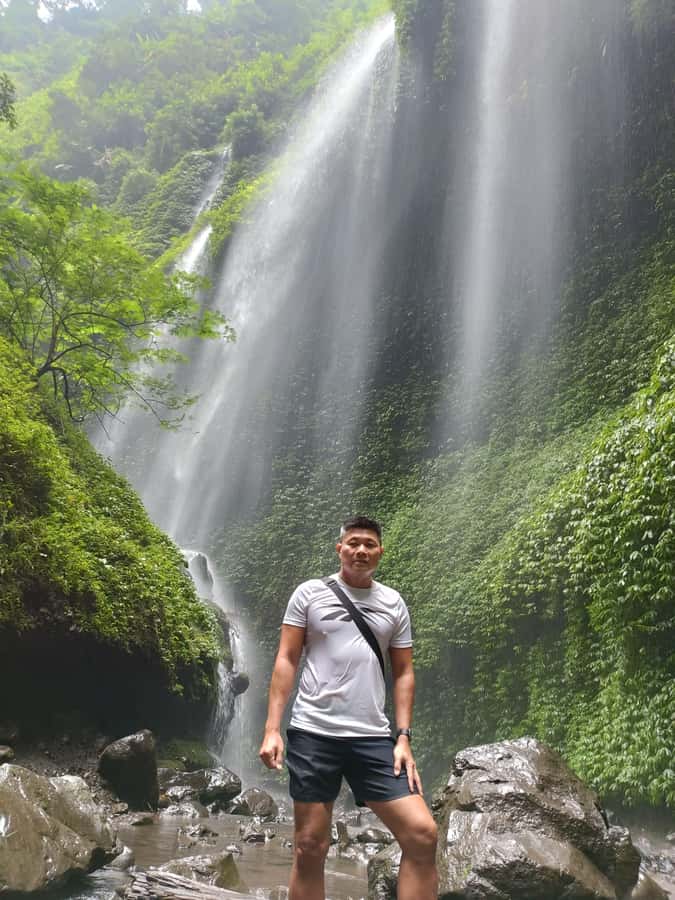 Surabaya: Bromo Sunrise & Madakaripura Falls Full-Day Tour - Madakaripura Waterfall: the narrow valley trek and getting wet the right way
