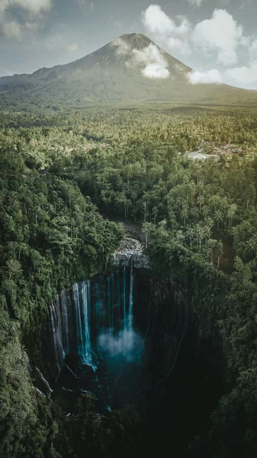 Surabaya or Malang Tumpak Sewu Bromo 2D1N Shared Guided Tour - Tumpak Sewu Waterfall Trek: Shoes, Slippery Rocks, and That Waterfall Moment