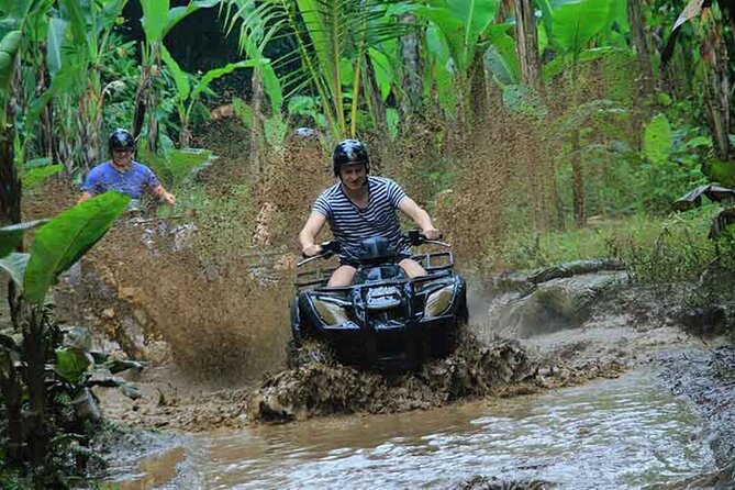Ubud ATV Quad Bike and Snorkeling at Blue Lagoon Beach - ATV riding in Ubud: trails, tunnels, waterfall stops, and rice field views
