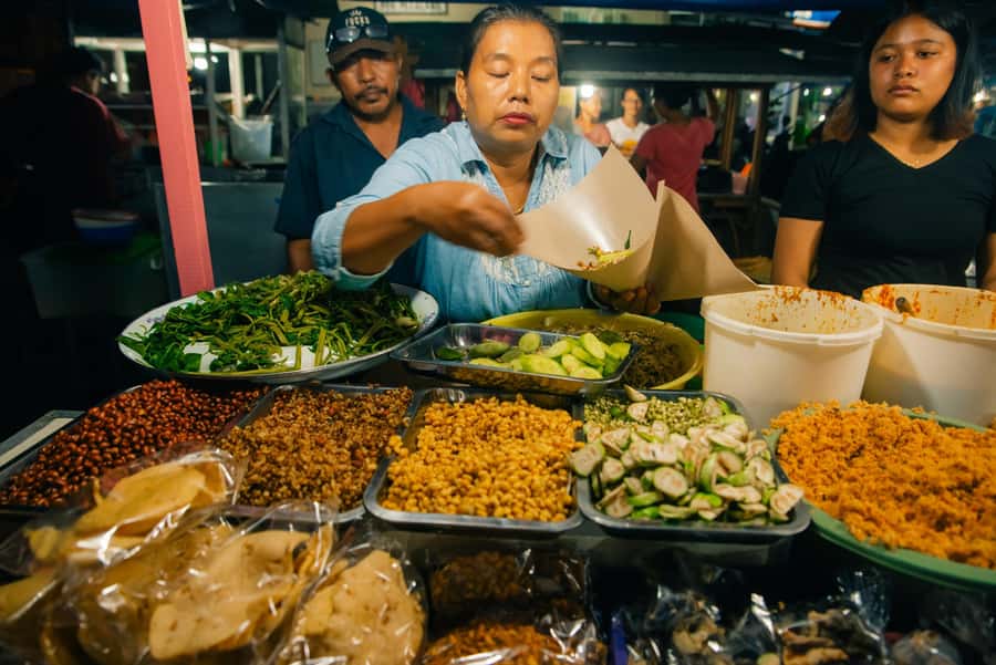 Ubud: Gianyar Night Market Food Tour with up to 17+ Tastings - Pickup, transport, and when you’ll actually be eating