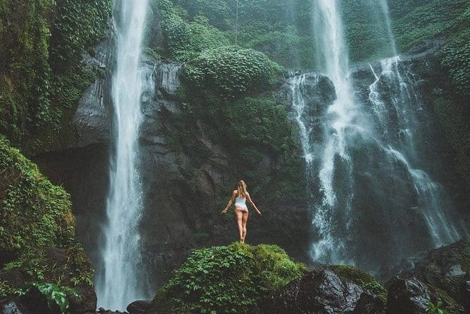 Ubud Hidden Gems Waterfall, Temple and Rice Terraces Private Tour - Tukad Cepung waterfall: when sunlight becomes part of the show