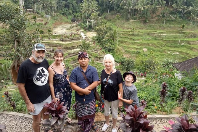 Ubud Hot Springs and Waterfall Private Guided Tour - Tirta Empul Temple: Sacred Water Purification Vibes