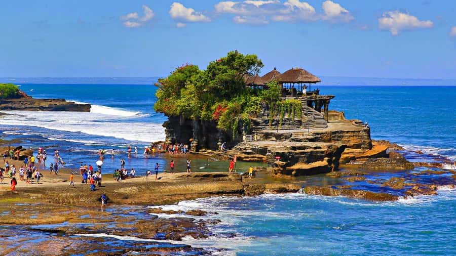 Ubud: Kanto Lampo Waterfall, Art Market, Cretya & Tanah Lot - Tanah Lot Temple: sacred rock, waves, and golden-hour photos