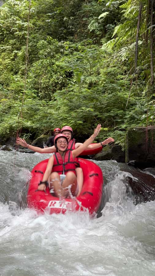 Ubud: Pakerisan Jungle River Tubing Adventure with Lunch - The tubing ride on the Pekerisan River: rapids, waterfalls, and that cave-river feel
