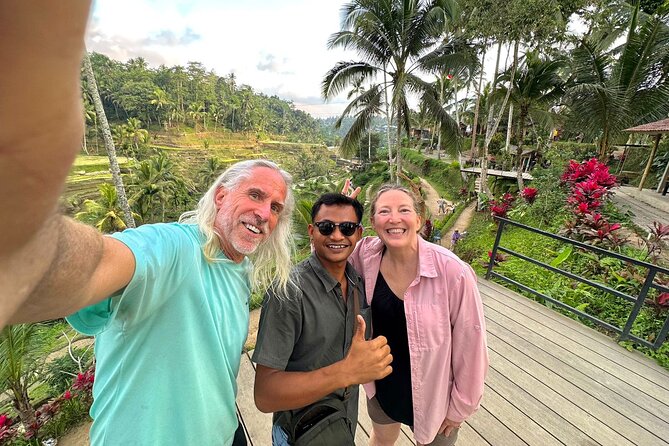 Ubud Tirta Empul Temple Swing And Waterfall Private Guided Tour - Stop 2: Sacred Monkey Forest Sanctuary, holy pool wishing moments