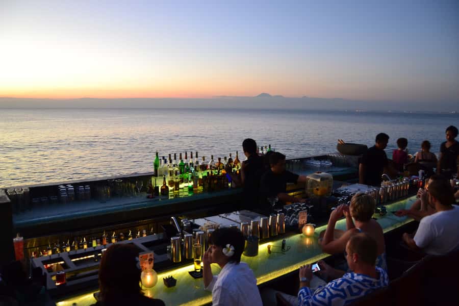 Uluwatu: Beach Club and Cliffside Private Bar Hopping Tour - Savaya Bali: infinity pool, DJ energy, and the crystal cube photo moment