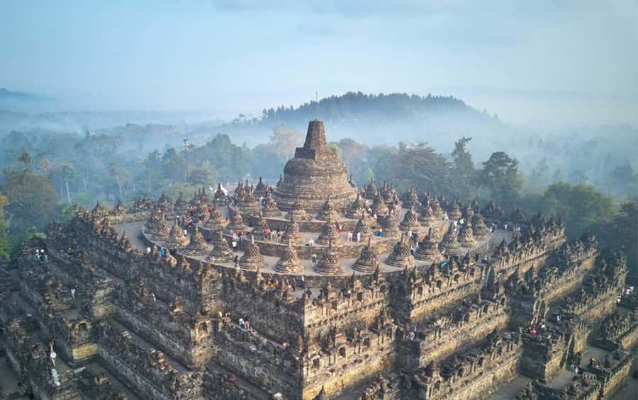 Yogyakarta: Borobudur 5-hour Tour with Climb-up & Transfers - Inside Borobudur: how the guide turns 2,672 panels into meaning