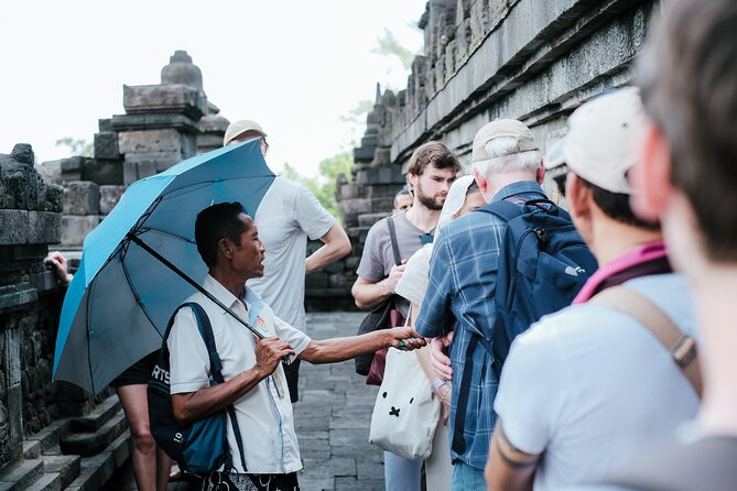 Yogyakarta Borobudur Climb Up And Prambanan Temples Sharing Tour - Borobudur Temple climb: reliefs, views, and the sandal help