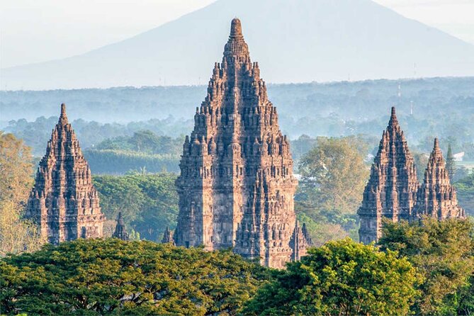 Yogyakarta: Borobudur Climb-up & Prambanan Day Trip All Inclusive - Borobudur climb-up: seated Buddhas and bell-shaped stupas