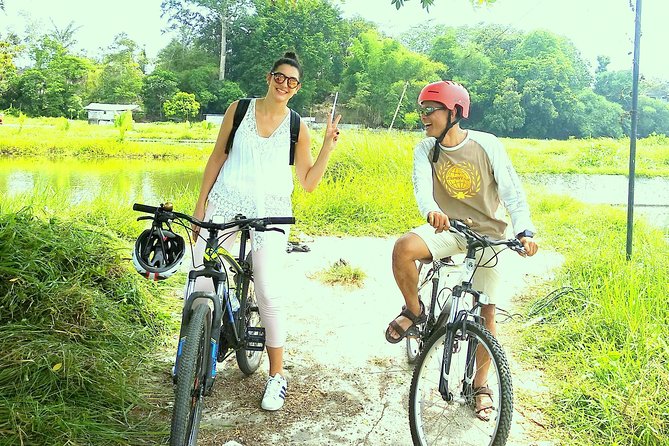 Yogyakarta Cycling Tour Around the Villages and Fish Farm - Start at Izzati Jogjatour: bikes, helmet, and getting ready the right way